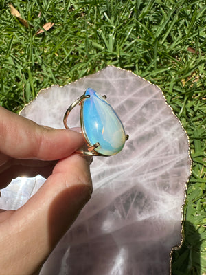 
                  
                    Opaline Gold arc ring - pear shape
                  
                