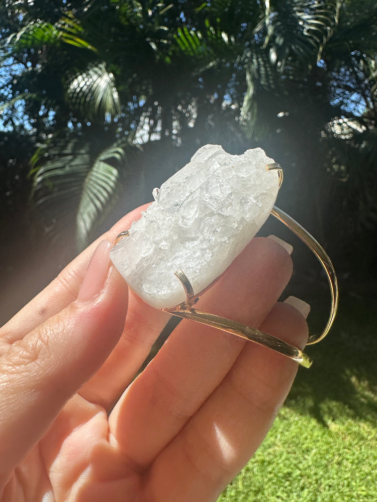 
                  
                    Clear Quartz Gold Bangle
                  
                