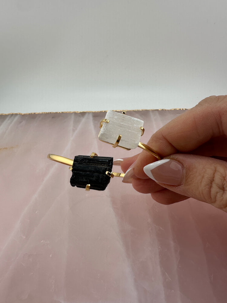 
                  
                    Selenite and Black tourmaline dual stone bangle - Gold
                  
                