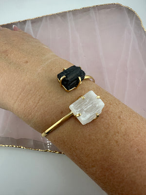 
                  
                    Selenite and Black tourmaline dual stone bangle - Gold
                  
                