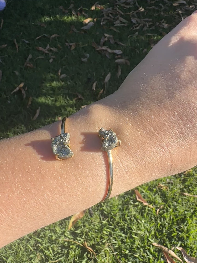 
                  
                    Load and play video in Gallery viewer, Pyrite Dual Moon Bangle - Gold
                  
                