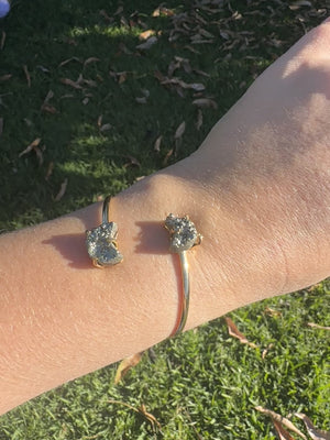 
                  
                    Load and play video in Gallery viewer, Pyrite Dual Moon Bangle - Gold
                  
                