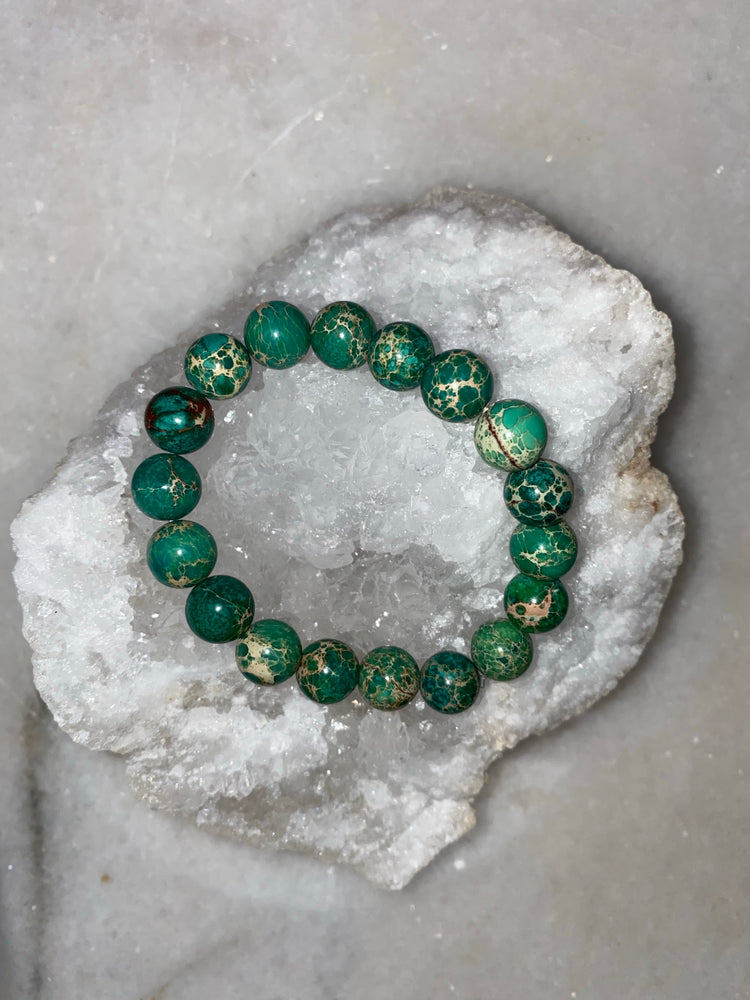 
                  
                    Green rainforest jasper crystal bracelet
                  
                